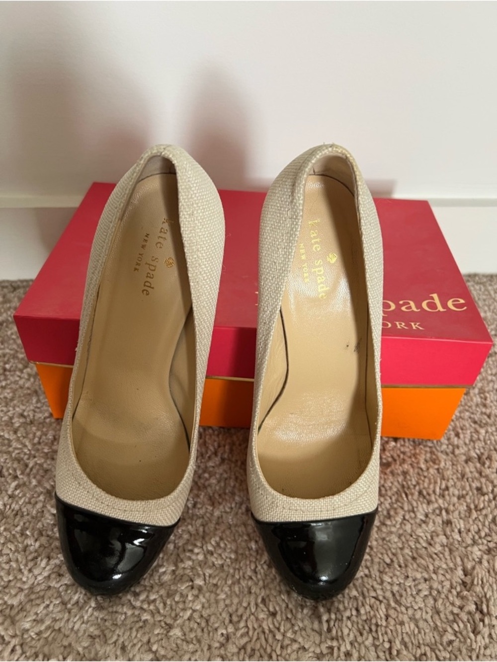 kate spade Cream and Black Cap-Toe Pumps